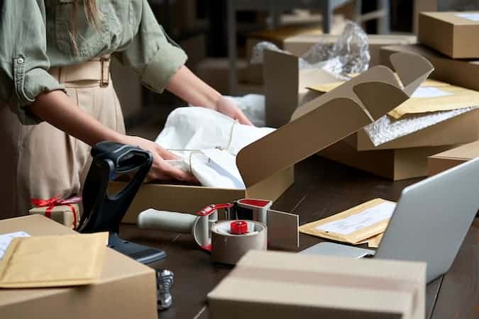 Woman packing box